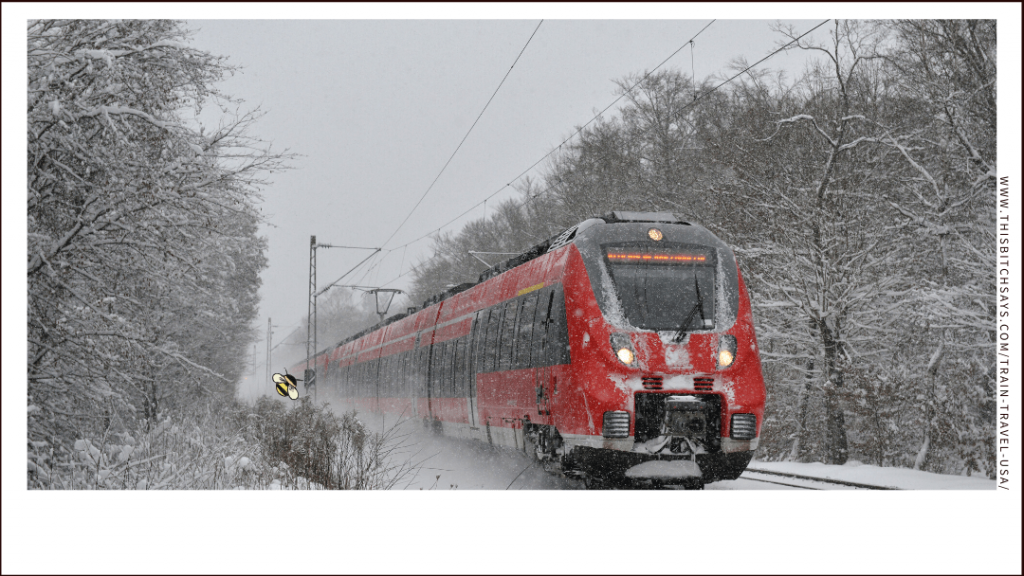 a train moving through snow